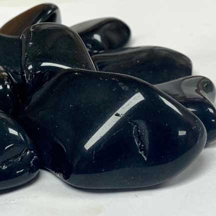 Black Obsidian Tumble Polished Stones - Gem Center USA INC